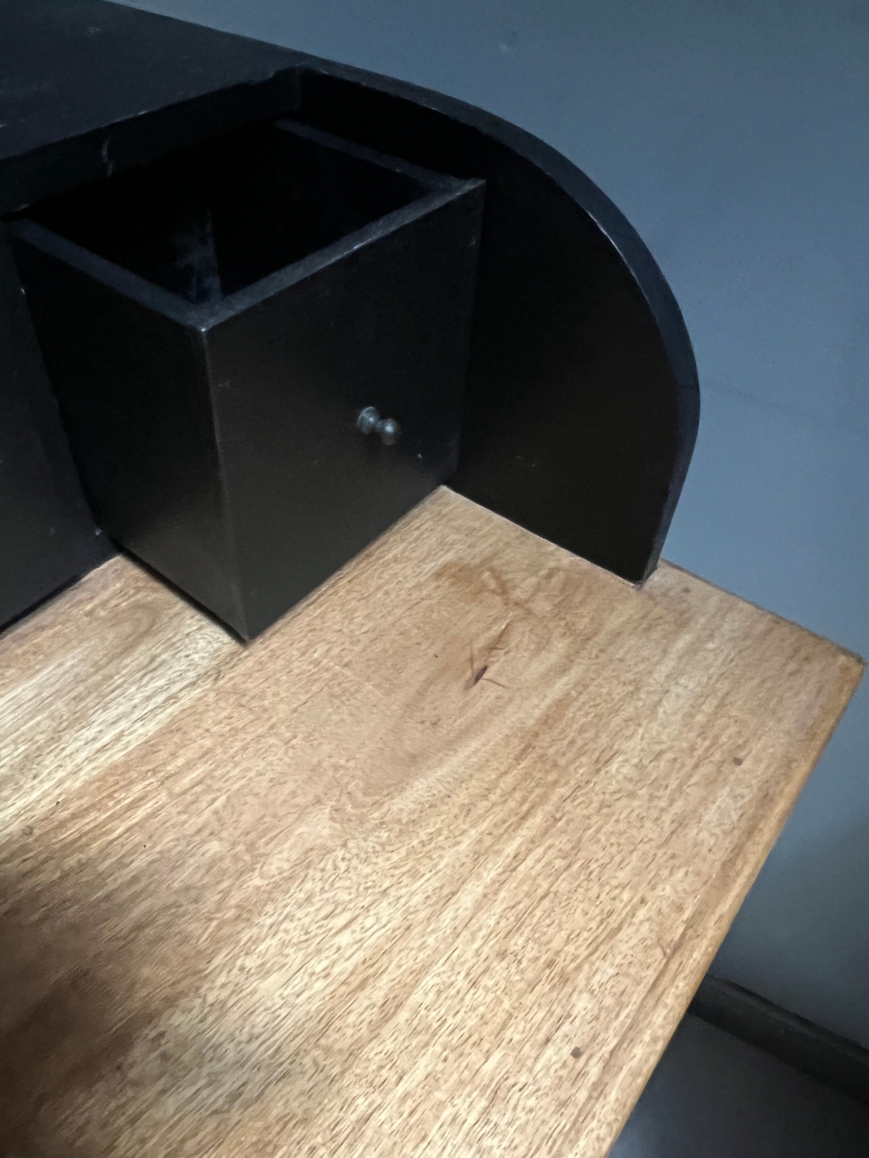Black stepped wooden desk