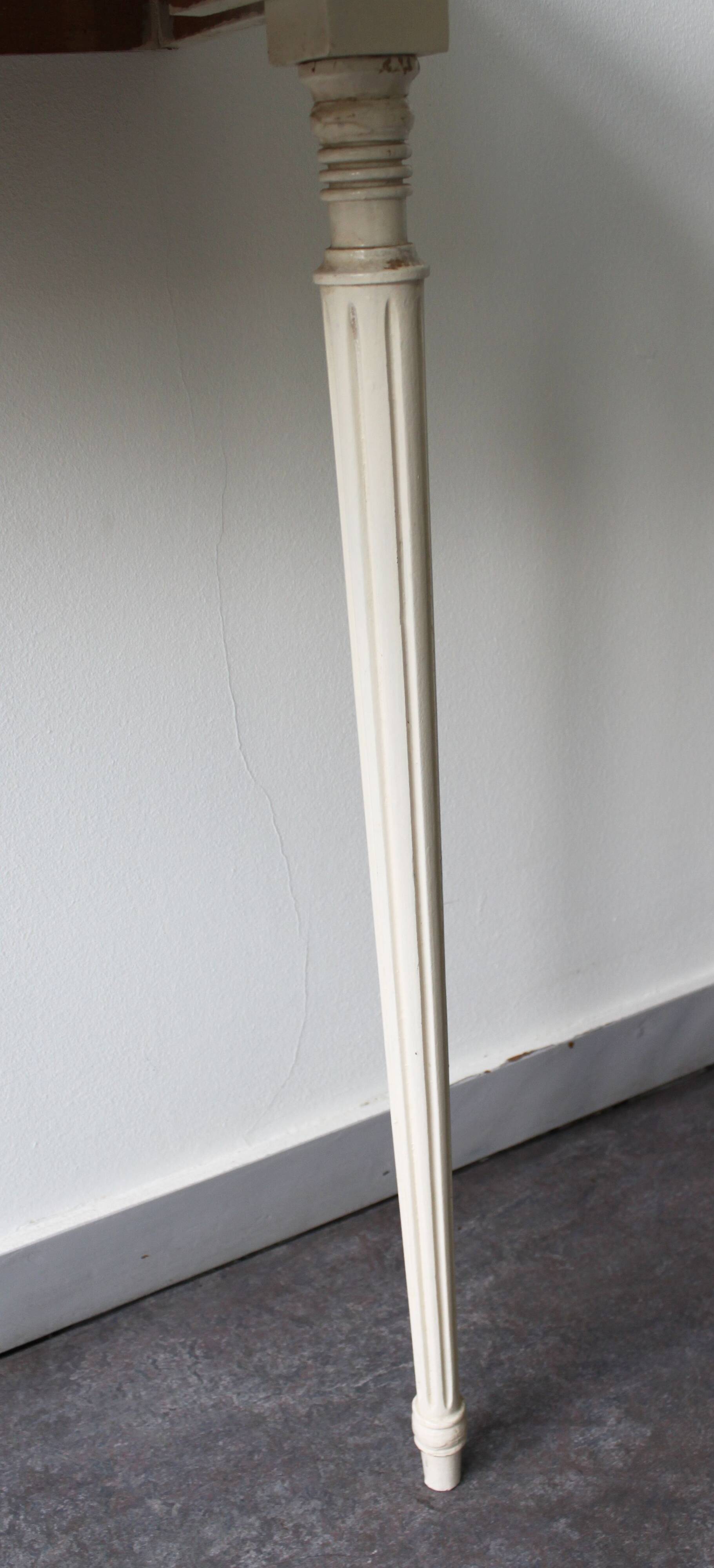 Two-legged wall console in Louis XVI style, painted wood.