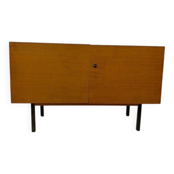 Vintage wooden furniture (chest of drawers, TV unit) with a black frame.