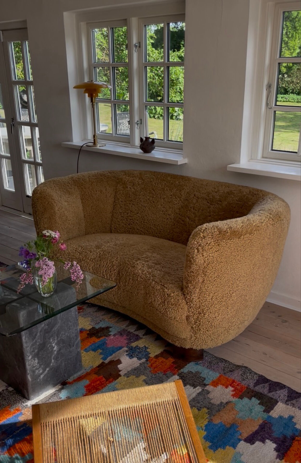 1950s banana sofa w/ lamb skin