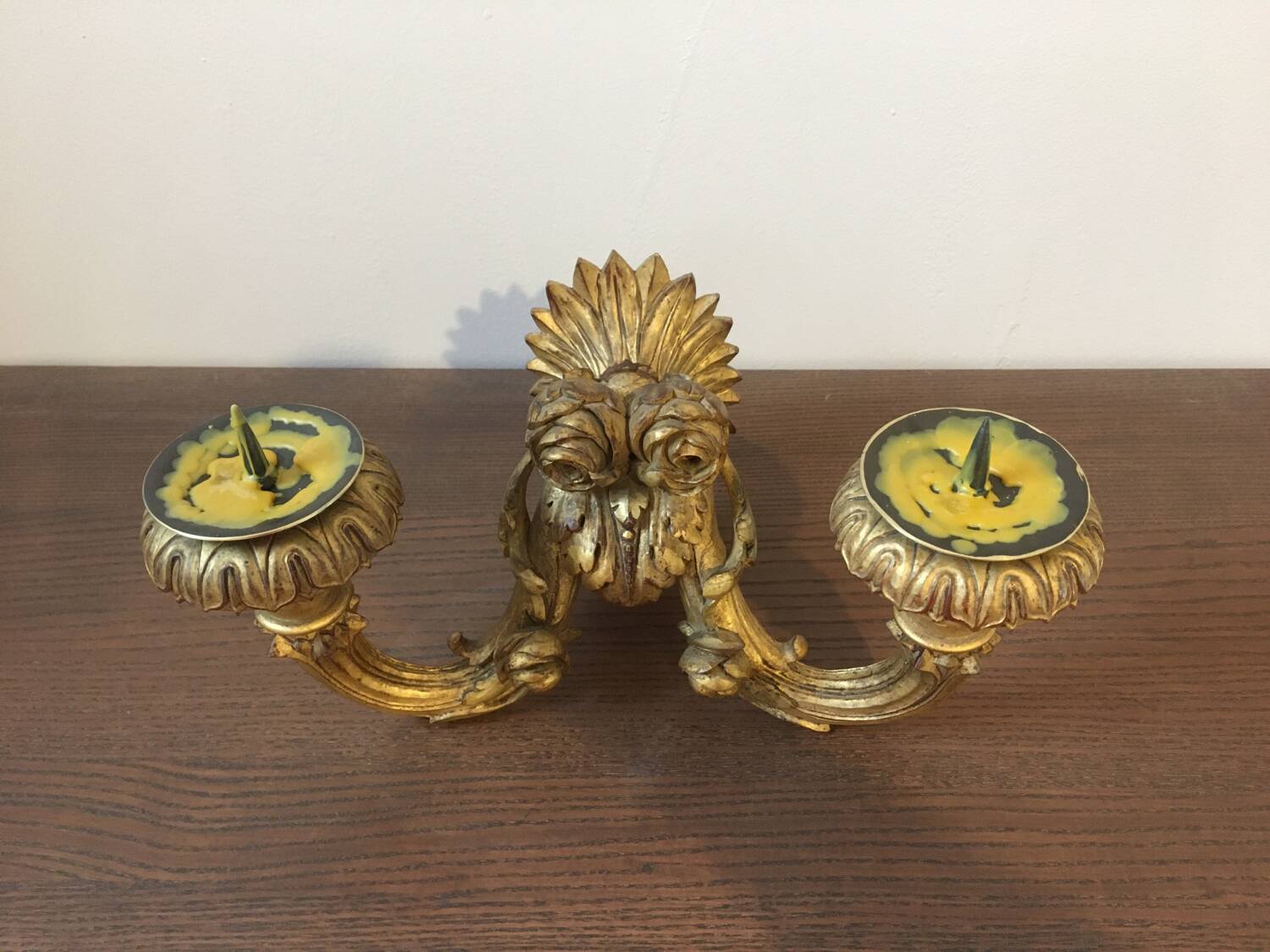 Golden wall candle holder