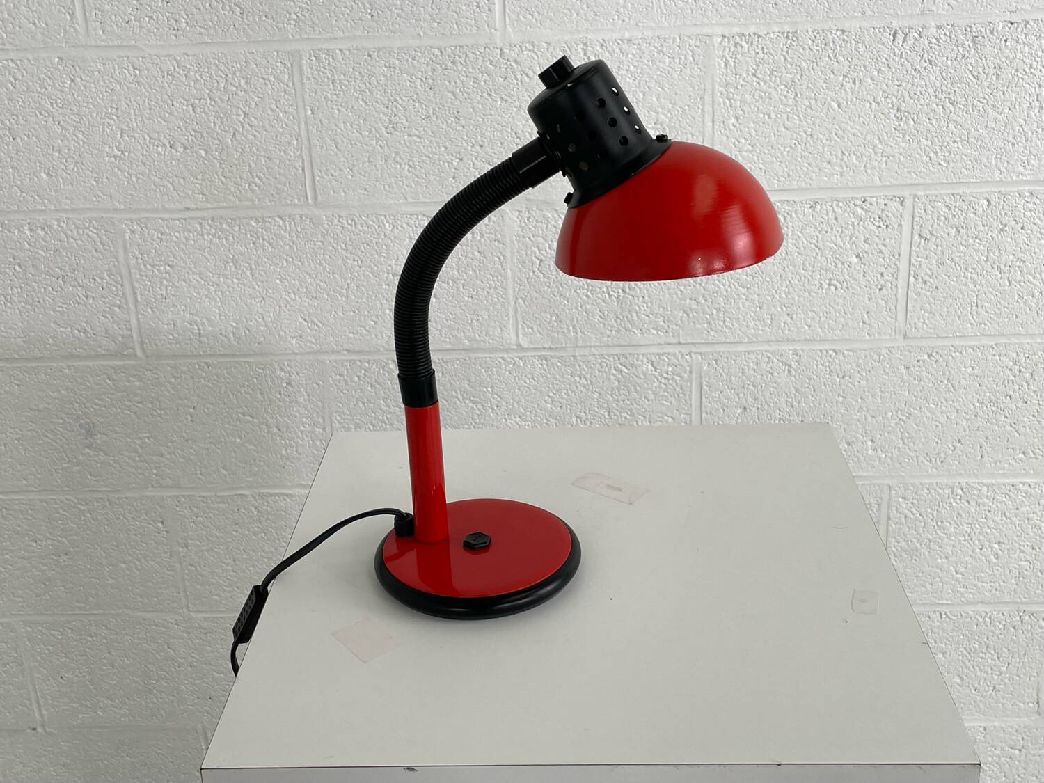 Red aluminor desk lamp from the 70s