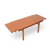 Rectangular dining table with extendable top, 1960s.