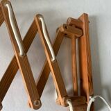 Extendable wall light by Translandia