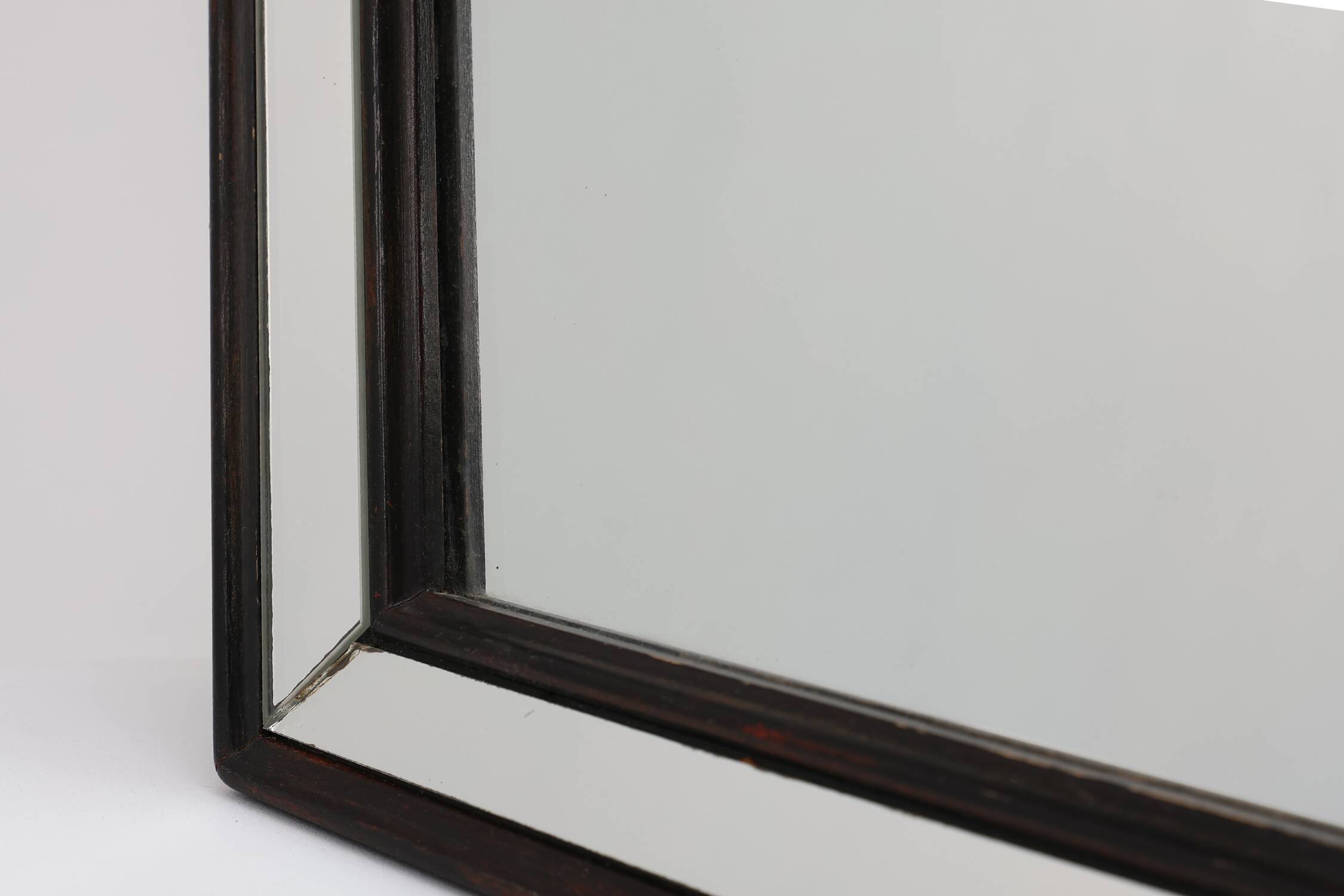 Miroir octogonal graphique du milieu du siècle avec cadre en bois noir et miroir,