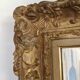 Carved and gilded wooden mirror early in the 20th century  - 96x76cm