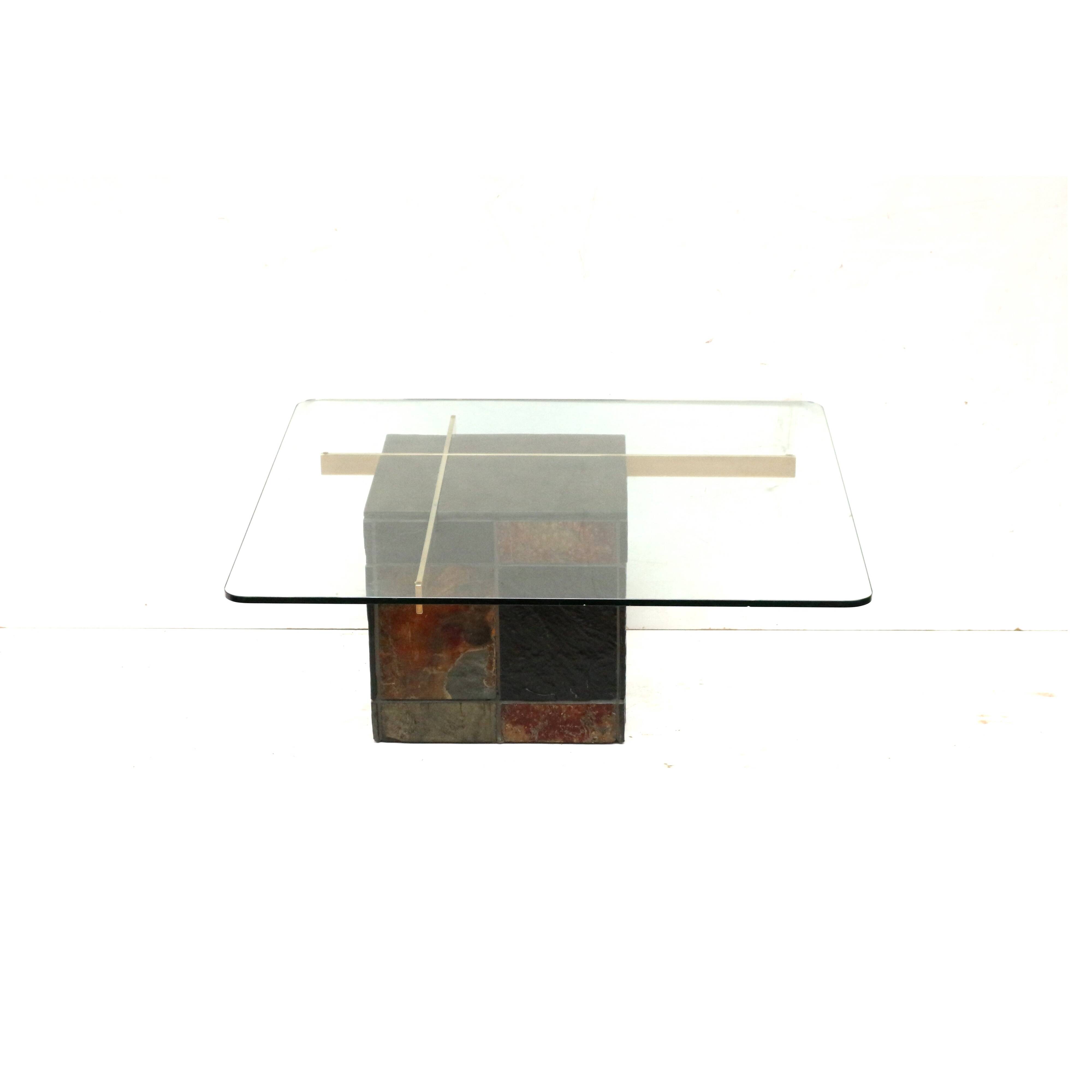 Italian design coffee table by Artedi with natural stone base and glass top