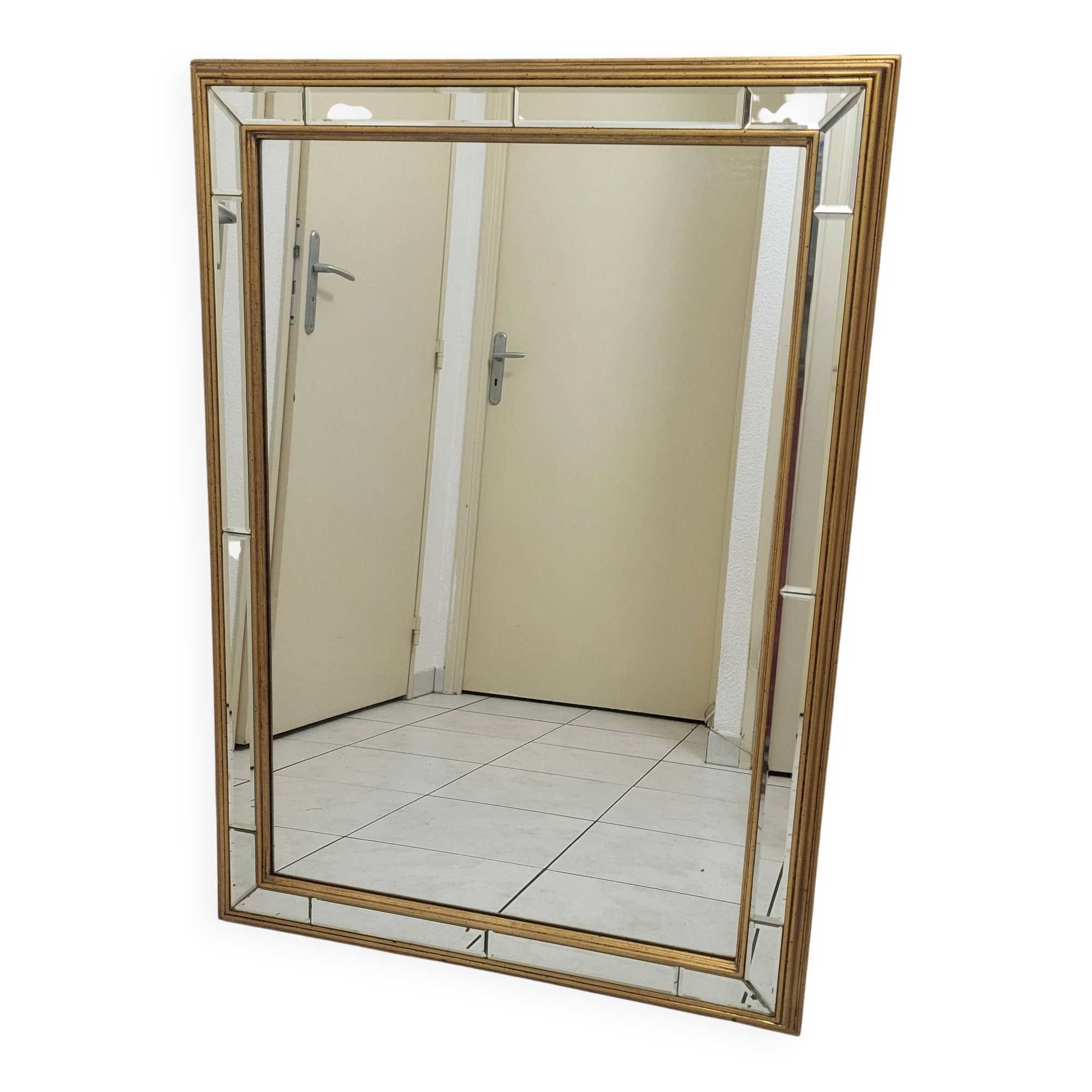 Bevelled and gold mirror with a frame by DeKnudt, Belgium 1960-70.