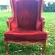 Louis XV style carved wooden shepherdess chair. Red velvet