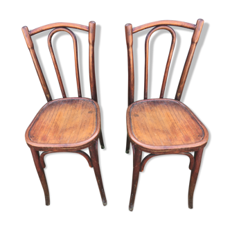 Pair of Bistrot chairs in curved wood, signed Luterma.