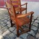 Pair of vintage oak armchairs with geometric design.