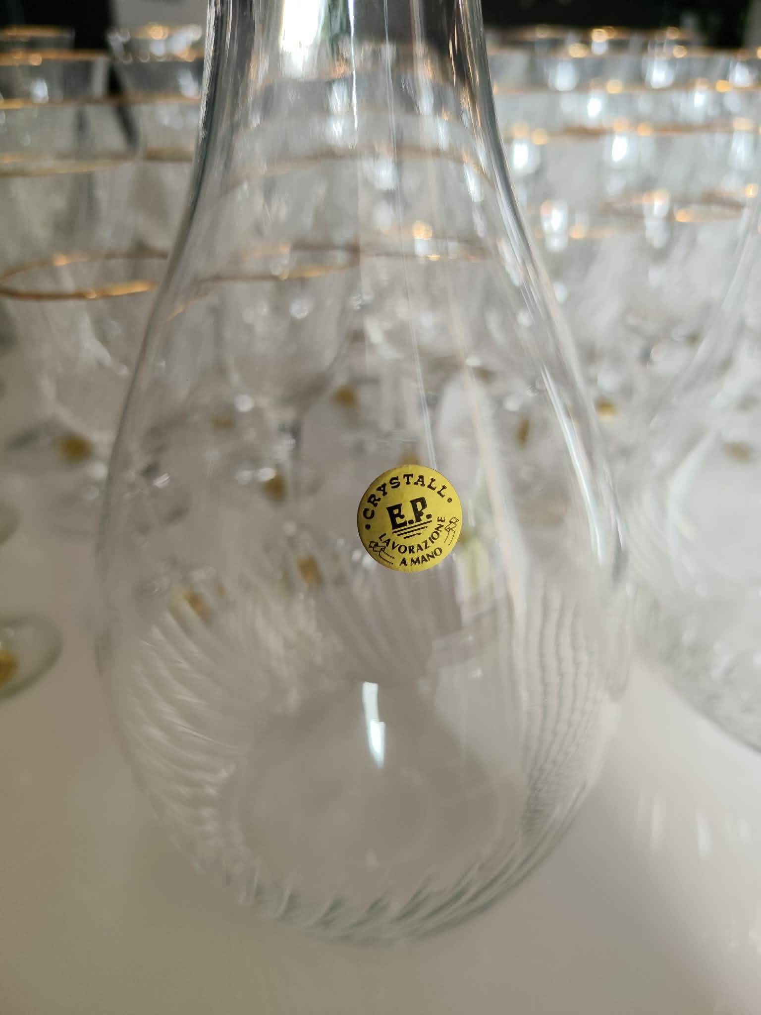 Crystal glassware set with decanter.