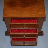 Set of hardwood dressers with finely carved bases.