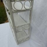 White rattan wall shelf