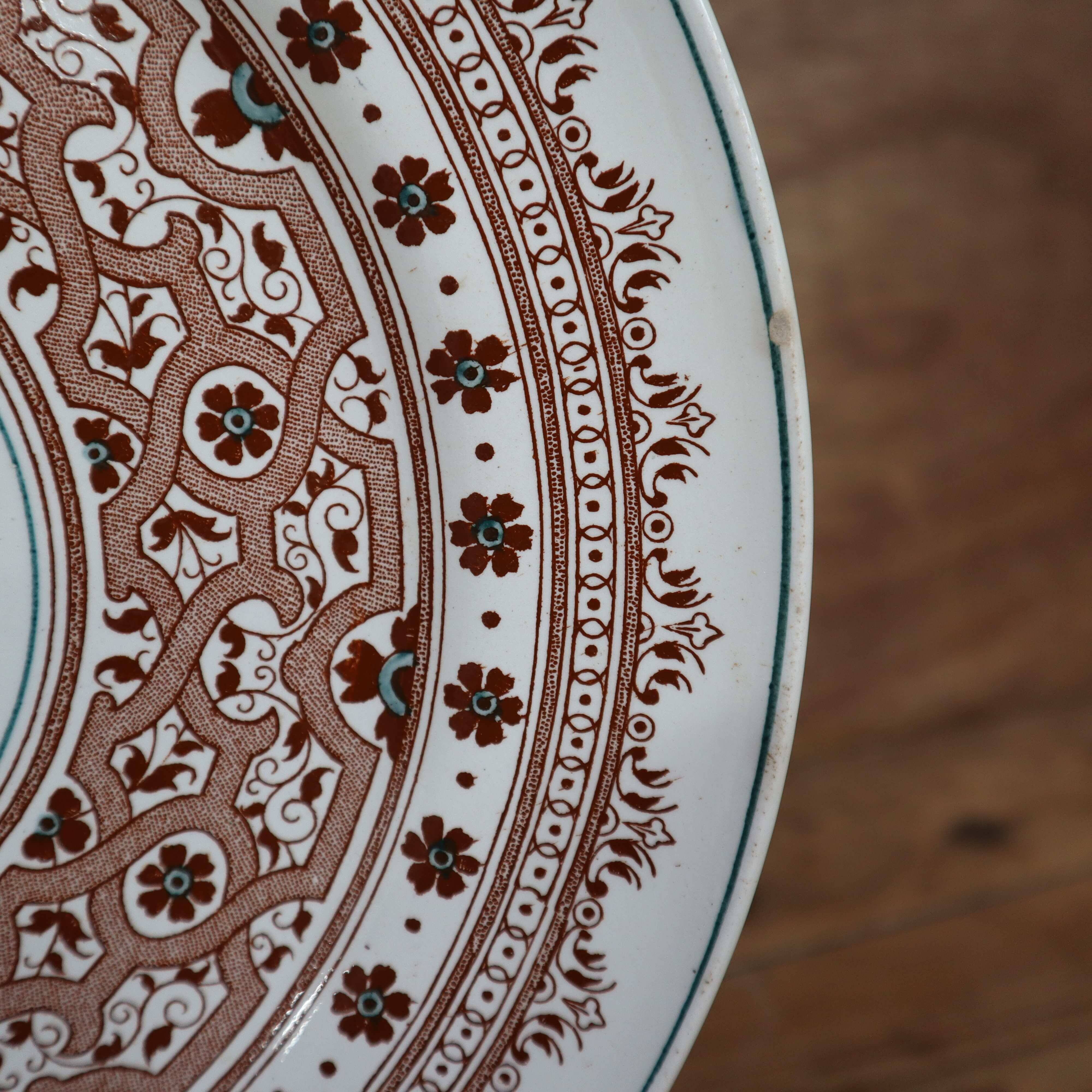 Old 26cm dish in Terre de Fer earthenware from Longwy, Henri II model