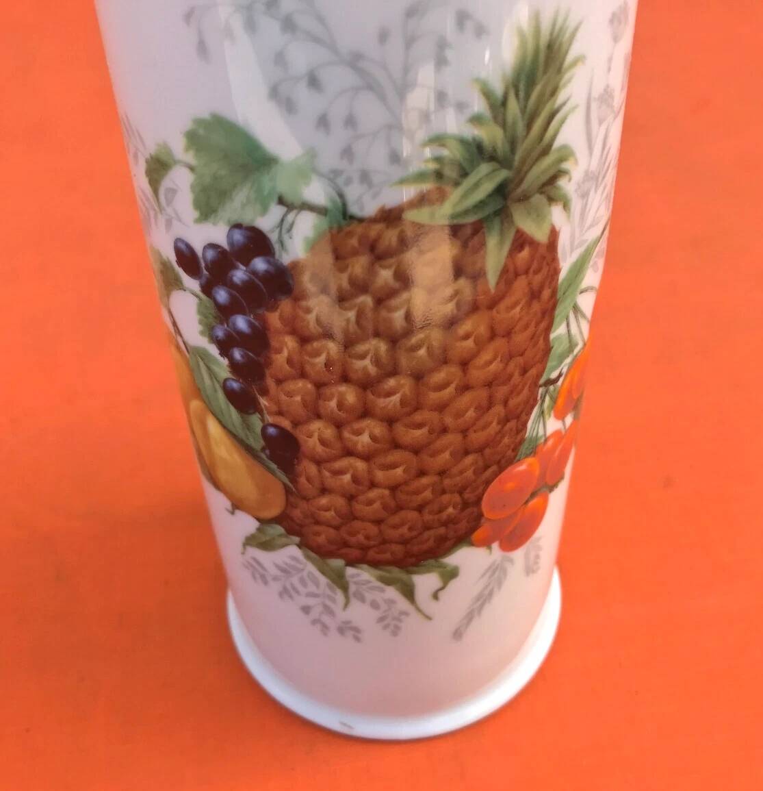 White porcelain bottle with fruit decoration