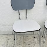 Set of two vintage grey Formica and chrome chairs.