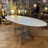 Oval table designed by Vittorio Introini, published by the Fratelli house.