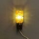 wall lights in rosewood look, with amber coloured glass and brass details.