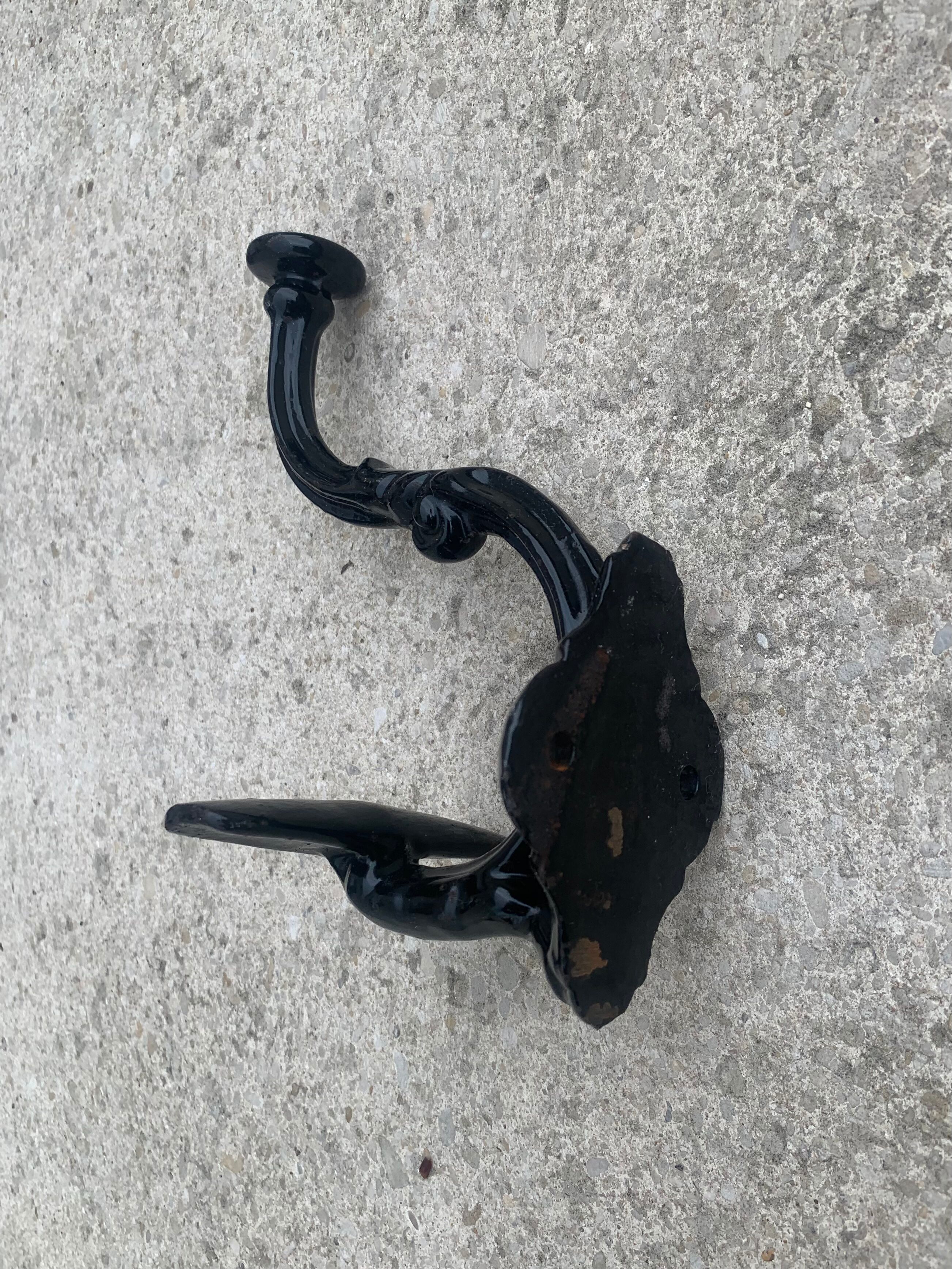 Set of 5 old cast iron hooks