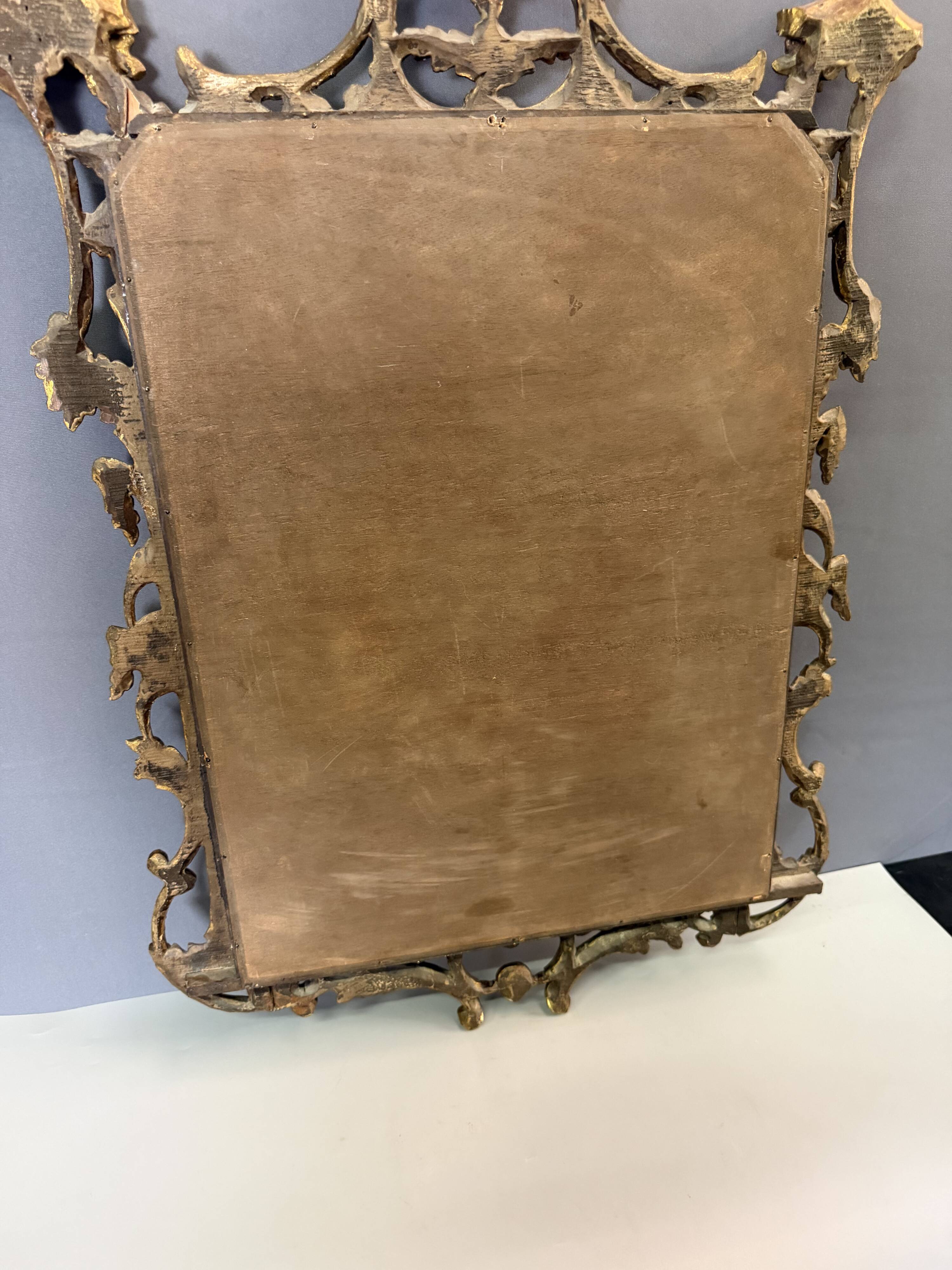 Italian mirror in gilded wood from the 19th century.