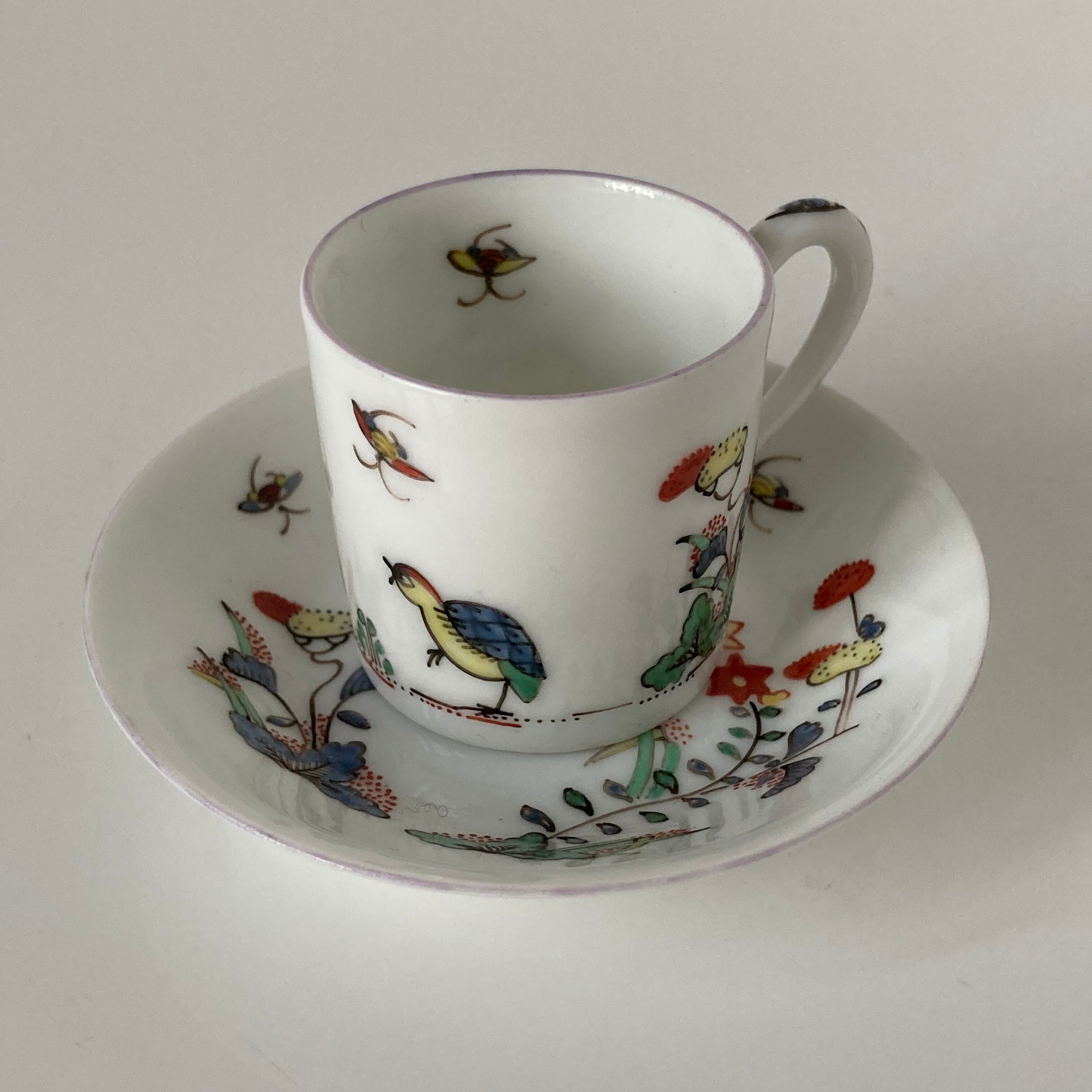 Limoges porcelain cup and sub-cup decorated in Chantilly in the Japanese Kakiemon style