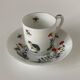 Tasse et sous-tasse en porcelaine de Limoges décorée à Chantilly dans le style japonais Kakiemon