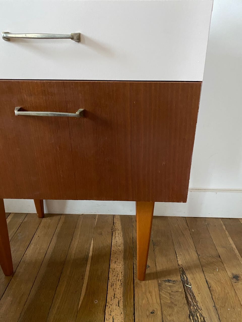 Wooden bedside table and nude