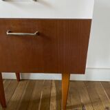 Wooden bedside table and nude