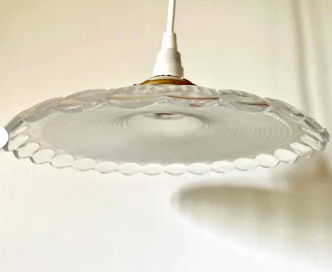 Pendant light with clear and frosted glass bowl