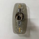 Trio of vintage chrome and smoked glass wall sconces