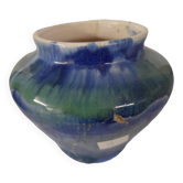 a blue flamed stoneware vase
