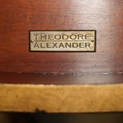 Half-moon console Eglomise Theodore Alexander with a gold finish.