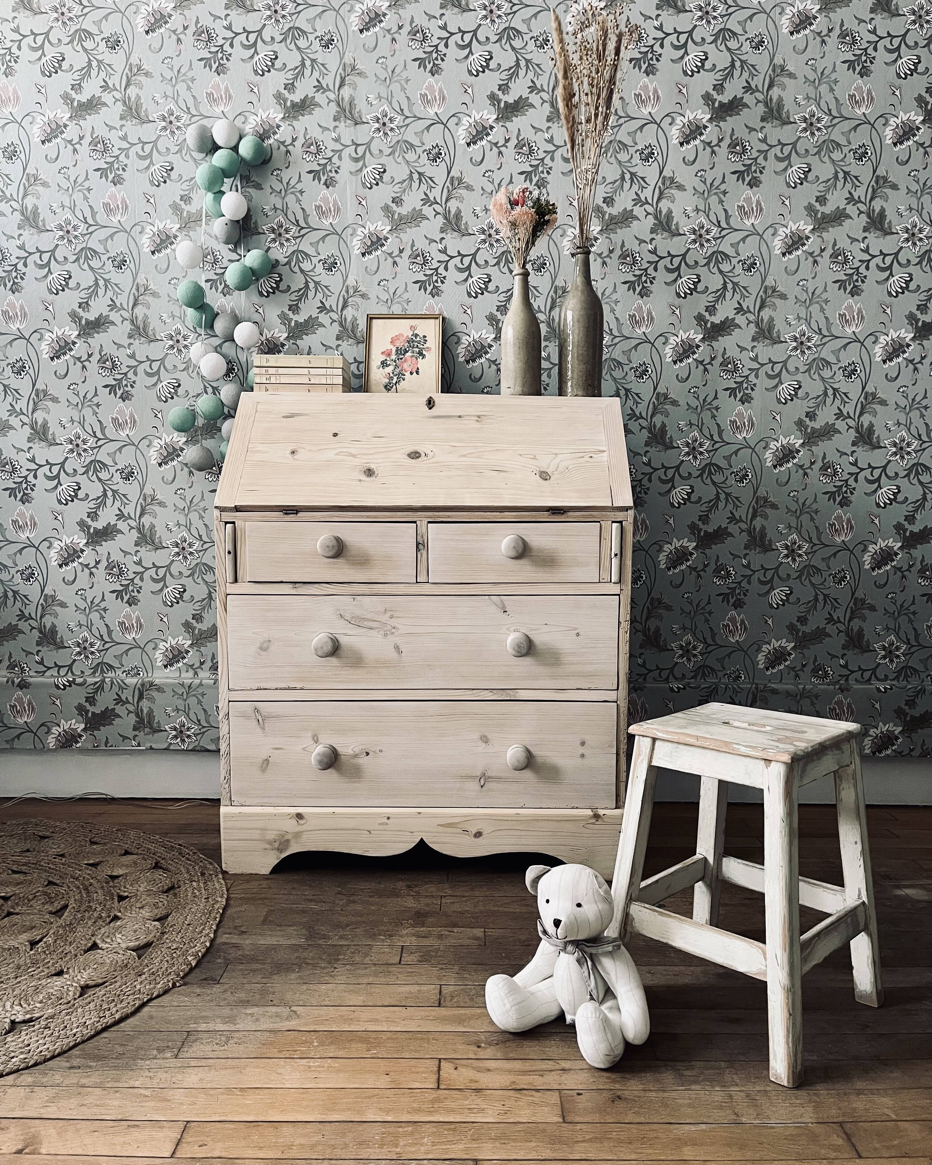 English chest of drawers topped with a sloping secretary