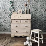 English chest of drawers topped with a sloping secretary