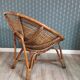 Paire de fauteuils coquille en osier