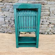 Set of 4 green folding chairs