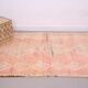 Tapis marocain vintage en laine rose