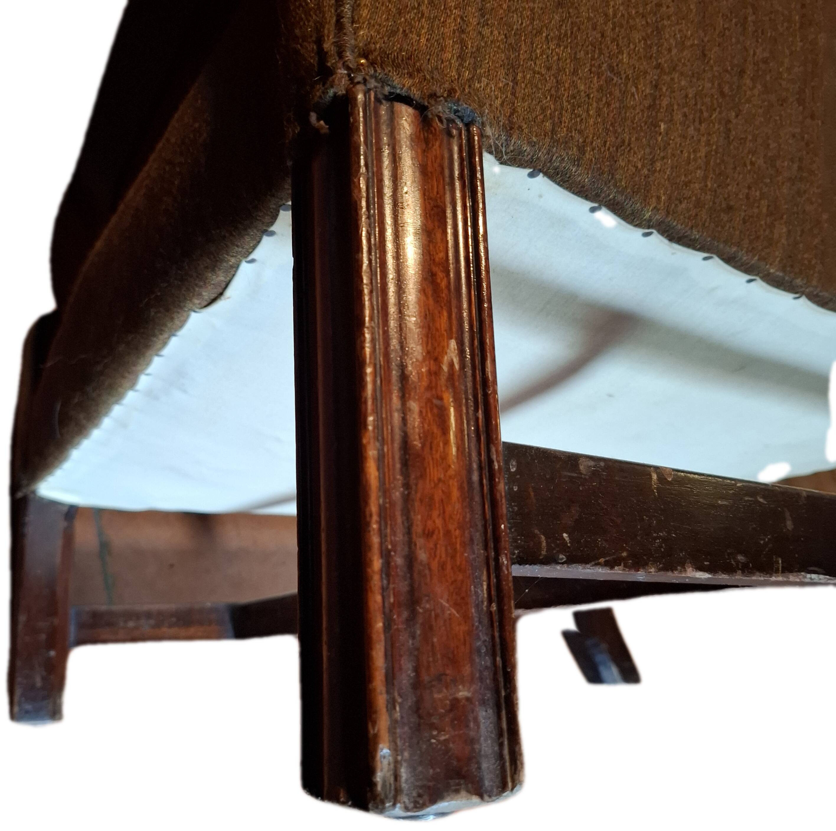 Antique wingback chair