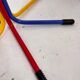 Children's coat rack in multi-colored metal