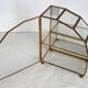 Pair of gilded brass, glass, mirror display cases from the 60s