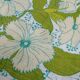 Nappe ronde à décor de fleurs vers 1970