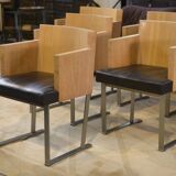 Set of 6 designer armchairs in oak and leather from the 1980s.