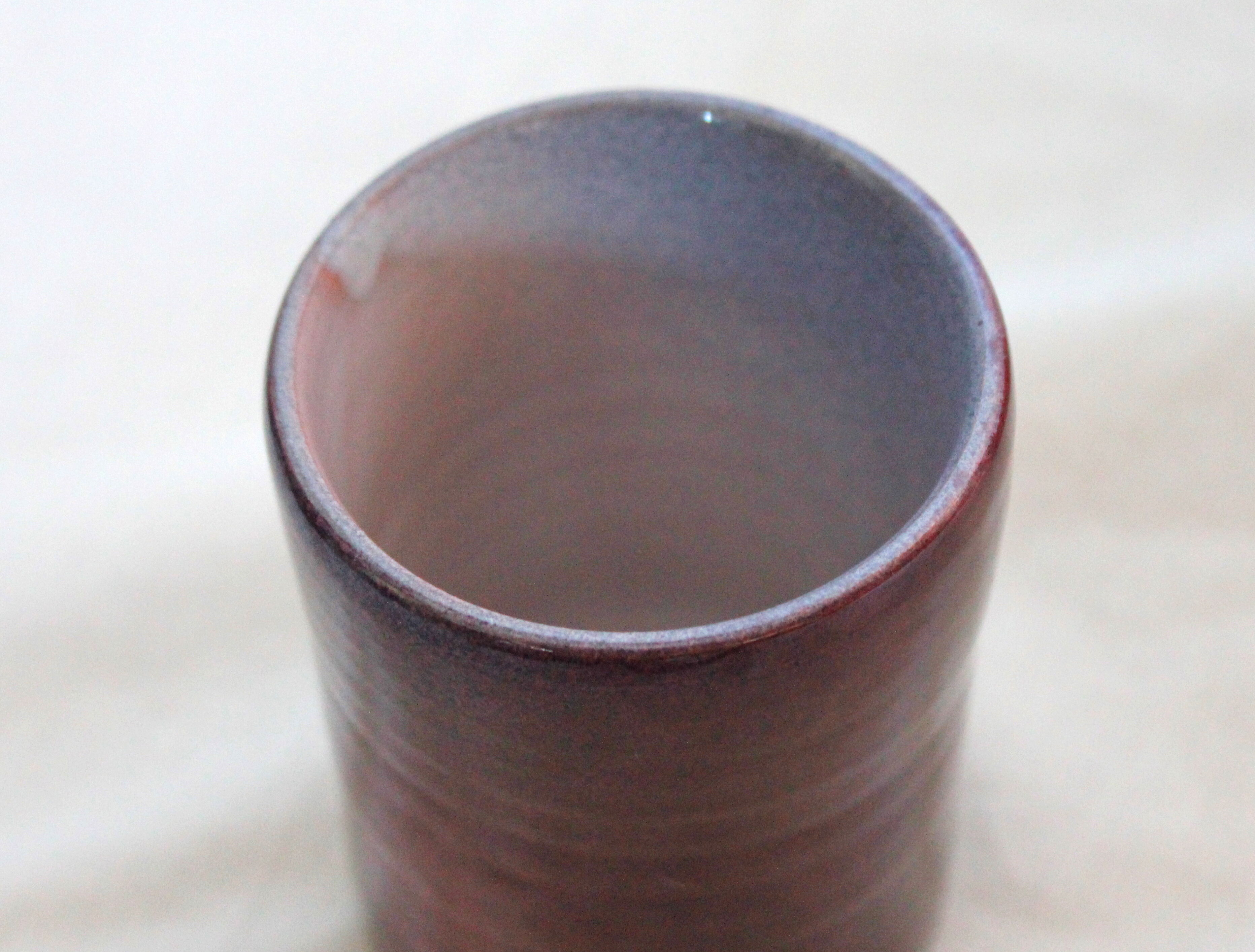 Purple ceramic pitcher and glasses set