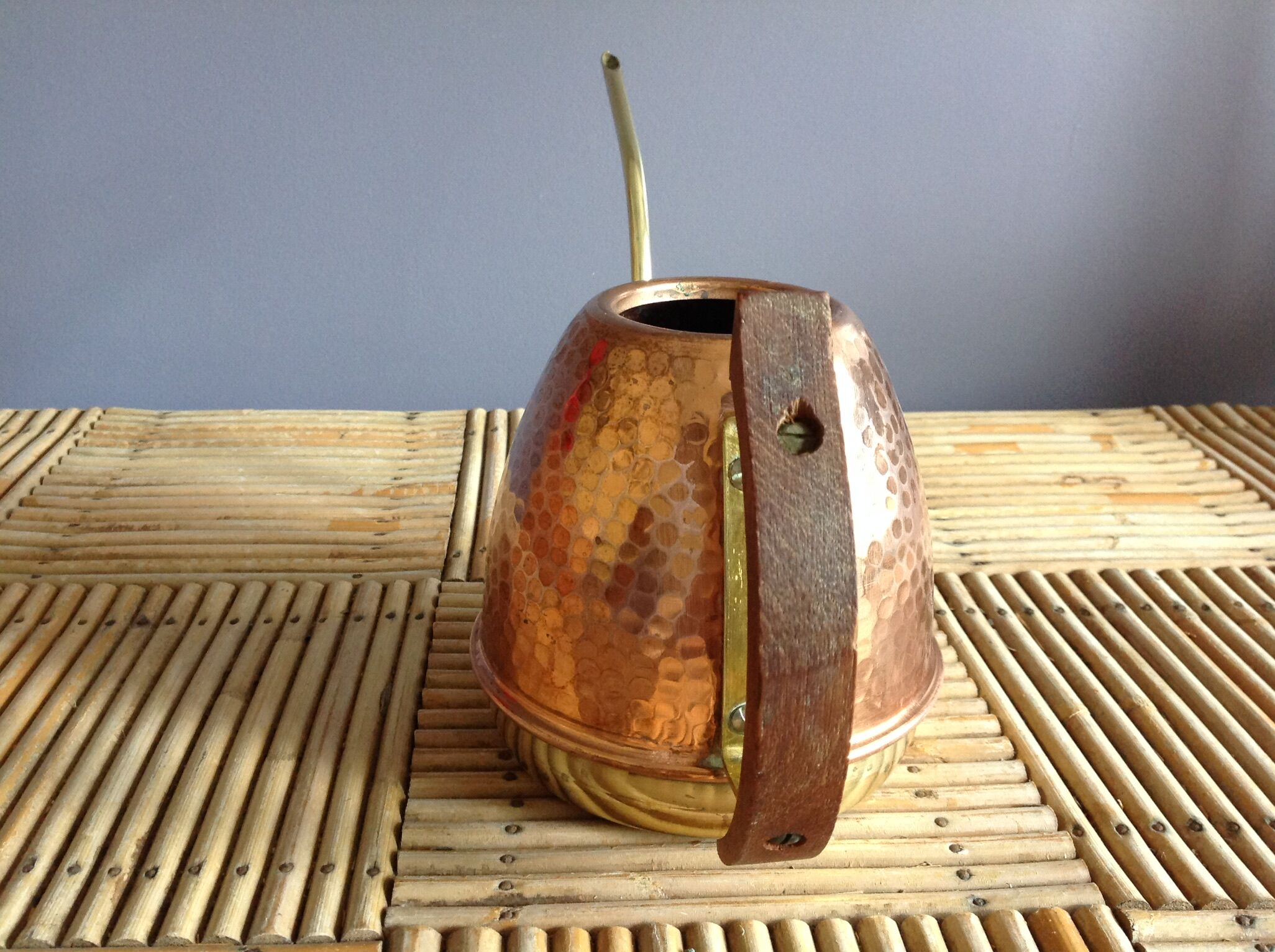 Copper and brass watering can