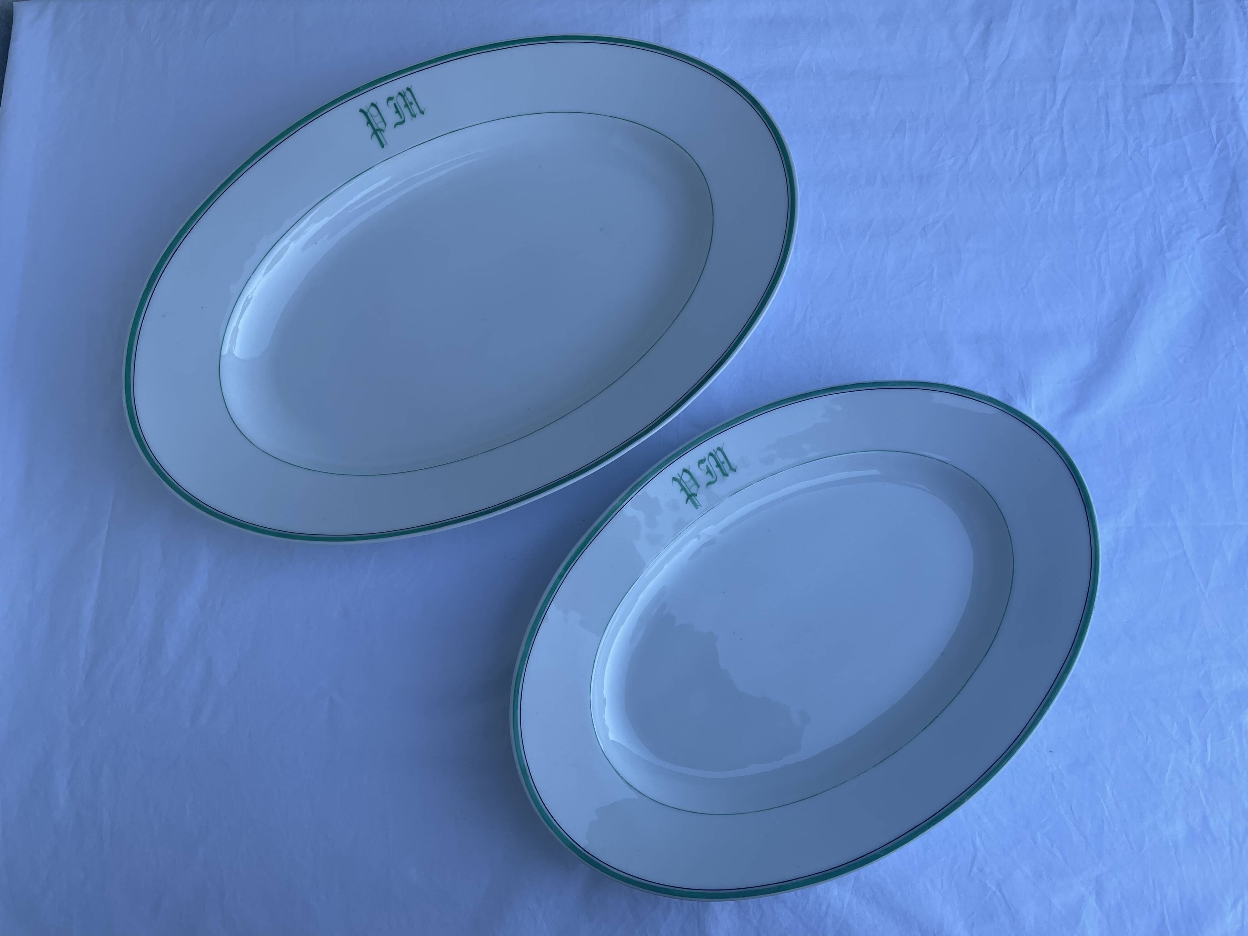 Antique oval plate with green monogram