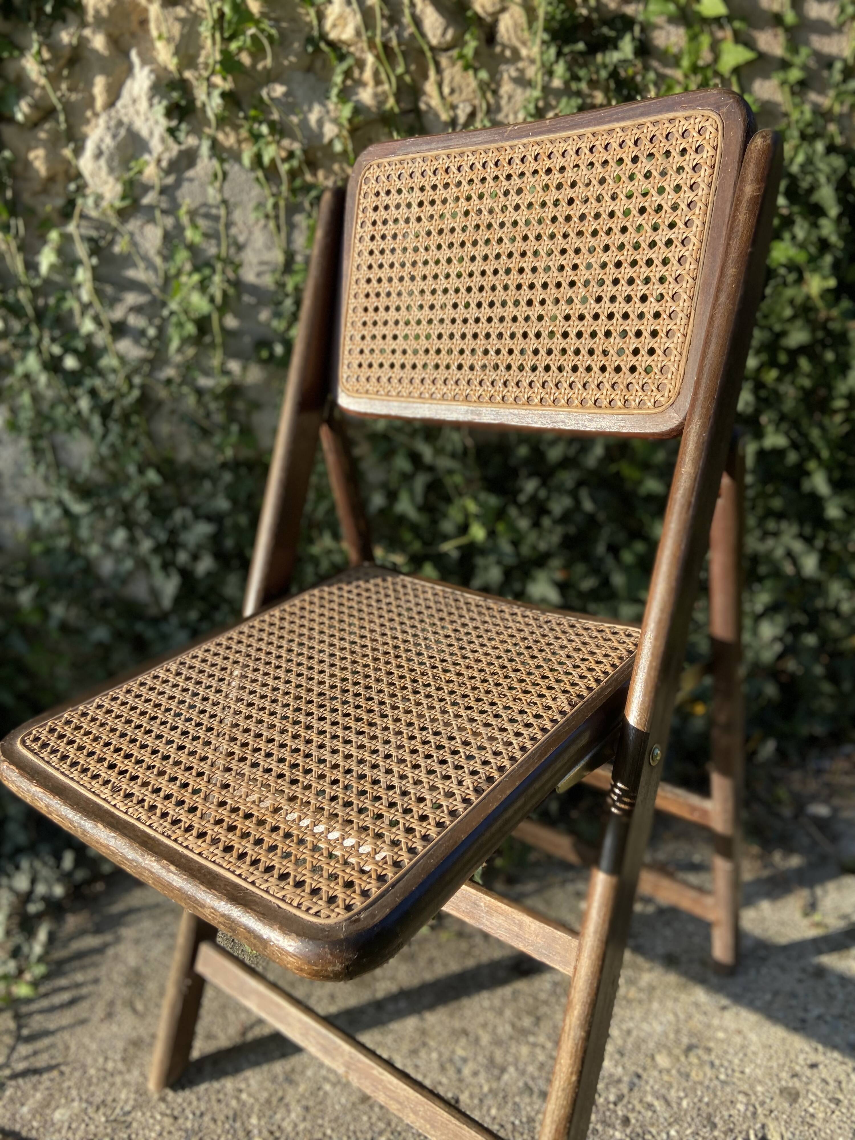 Folding chair in wood and cane.