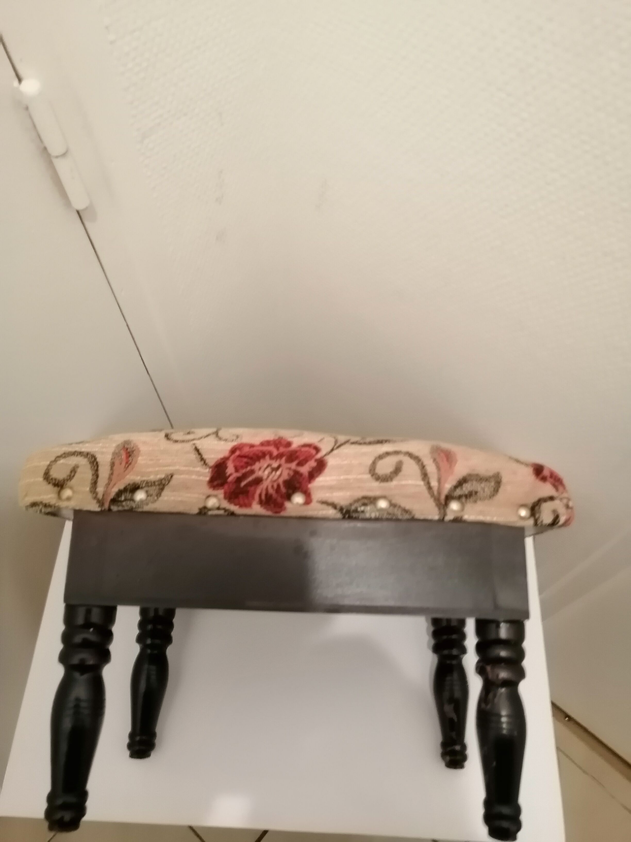 Antique footrest stool in wood and fabric