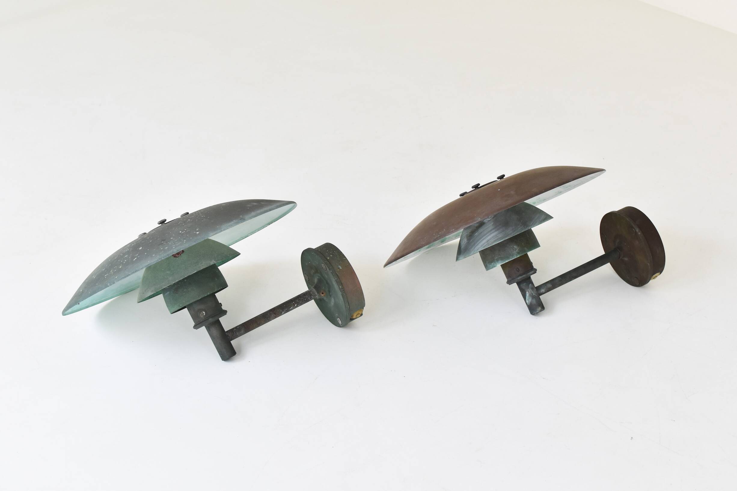 A set of two ph 4.5 copper wall lamps by poul henningsen for louis poulsen, denmark 1980s.