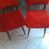 Pair of vintage red moumoute chairs with compass legs
